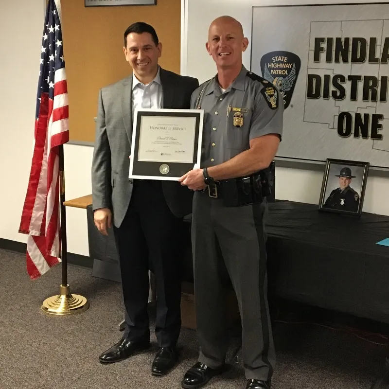 Daniel Bionci receiving an Honorable Service Award from the Ohio State Highway Patrol during his law enforcement career